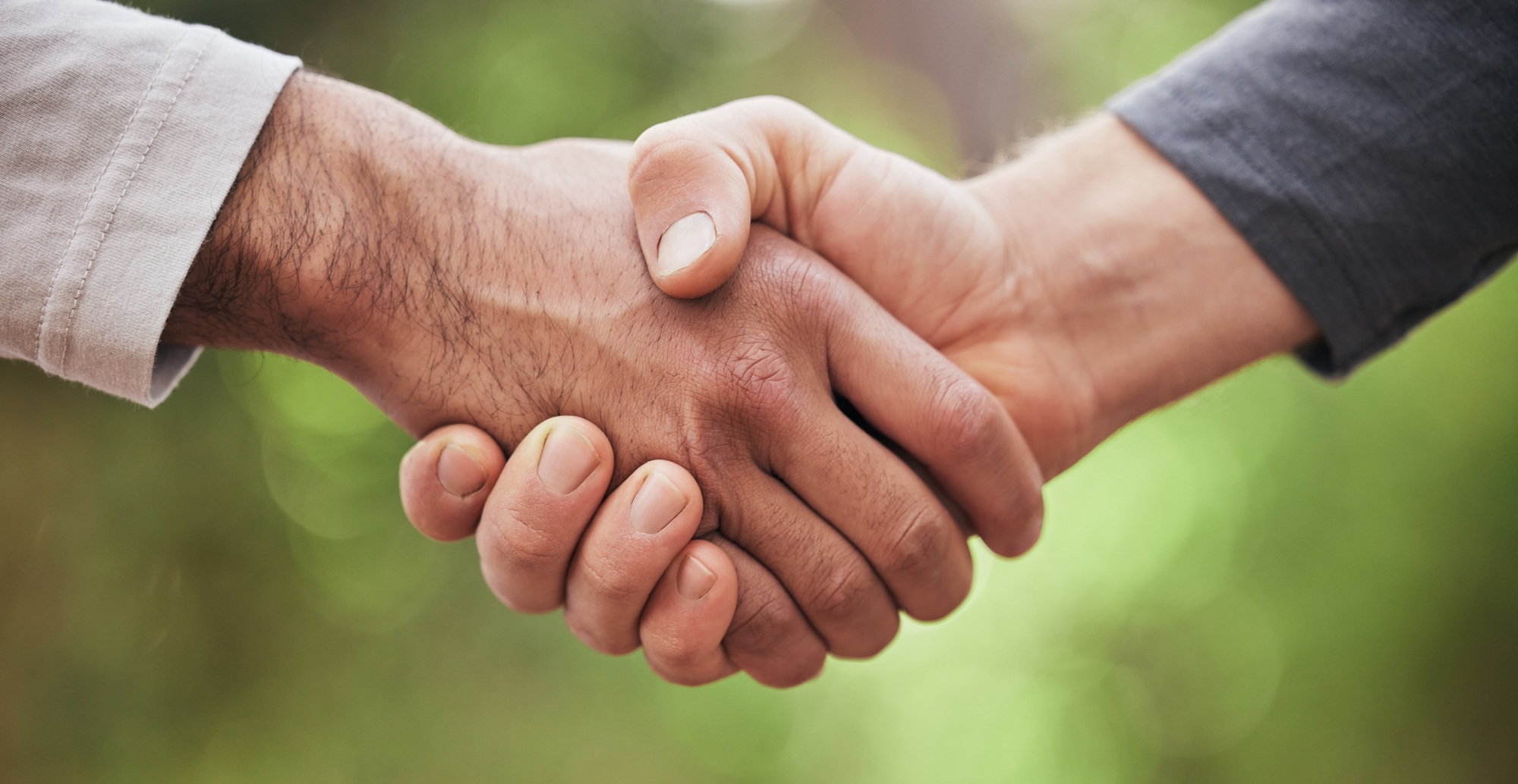 Support, welcome and handshake with people in nature for motivation, thank you and meeting. Teamwor